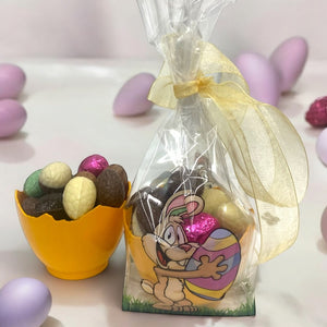 Filled Easter eggs in half egg in decorated bag