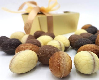 125 gram amb. paaseitjes in gouden doosje - Macaronstore.nl