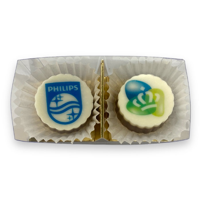 2 ambachtelijke bonbons met logo in verpakking (minimaal 25 stuks)