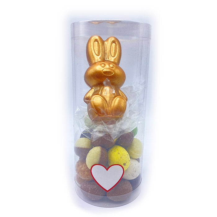 Golden chocolate bunny with Easter eggs